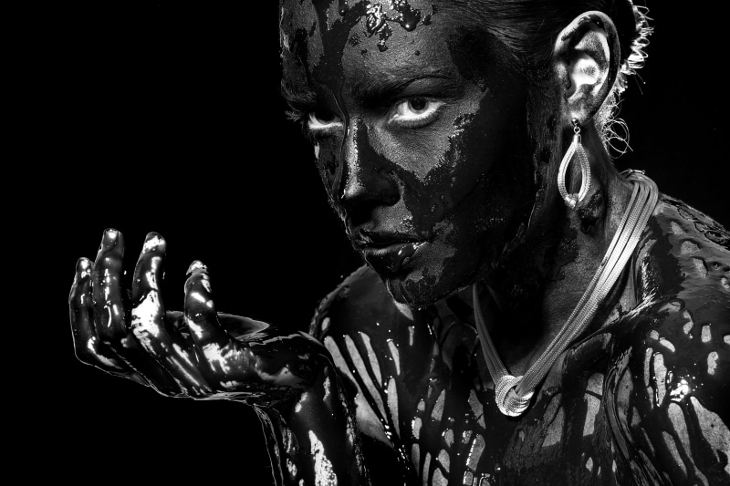 jewelry, real people, beautiful, black, contact, beauty, portrait, contemplation, dark, design, imagine, contemporary, girl, black background, front view