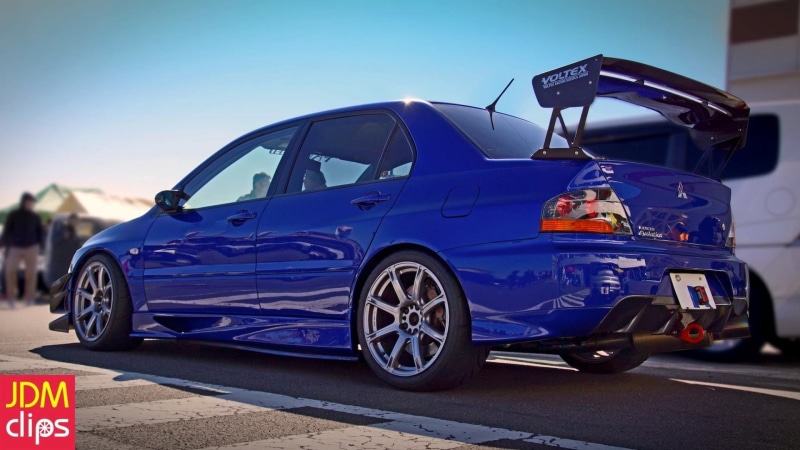 sign, architecture, land vehicle, car, Mitsubishi Lancer, sedan, focus on foreground, 1080P, Mitsubishi Lancer Evolution IX, JDM, clear sky, blue, city