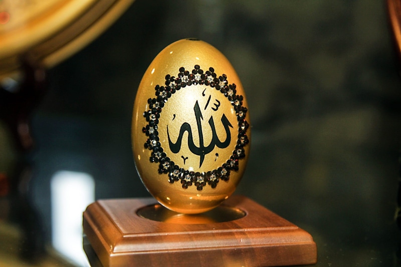 calligraphy, decor, business, ornament, istanbul, single object, egg, focus on foreground, indoors, brown, museum, wood - material, mosque, print, celebration