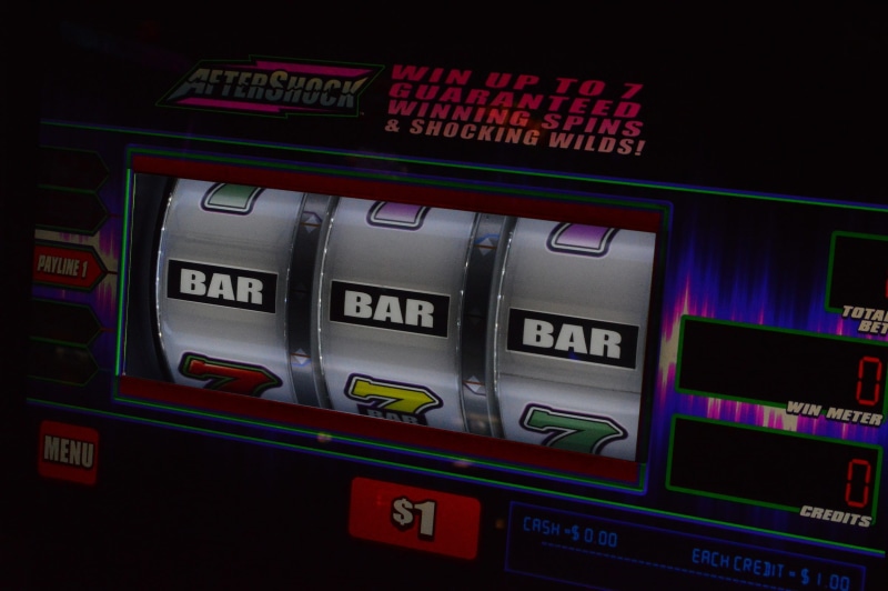 text, Gamble, number, jackpot, Casino, leisure activity, Machine, slot Machine, indoors, illuminated, vending machine, gambling, communication, western script