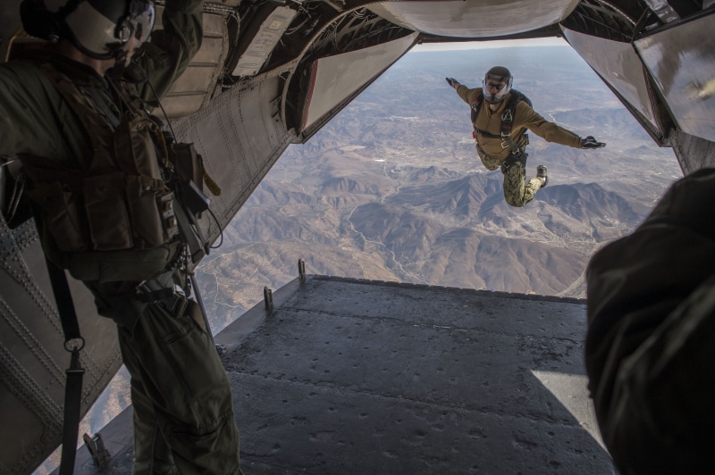 exhilaration, falling, outdoors, airplane, armed Forces, mid-air, unrecognizable person, excitement, gun, daytime, air force, special forces, rifle, leaving