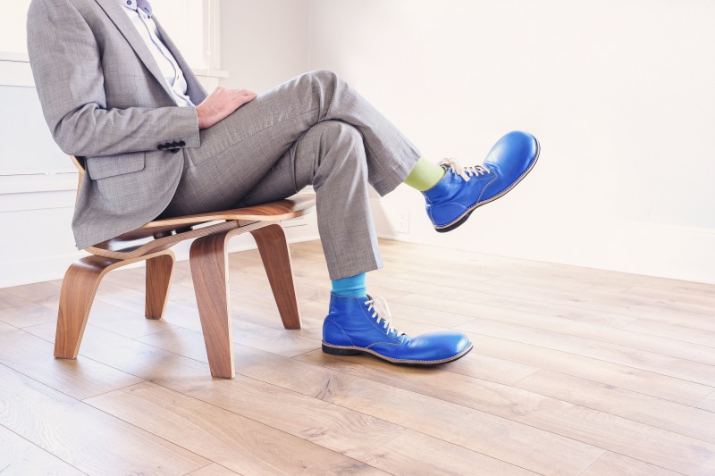 full length, side view, clown, shoes, modern, home Interior, leather, copy Space, women, sunlight, shoe, fashion, hardwood floor, adults Only, seat, indoors