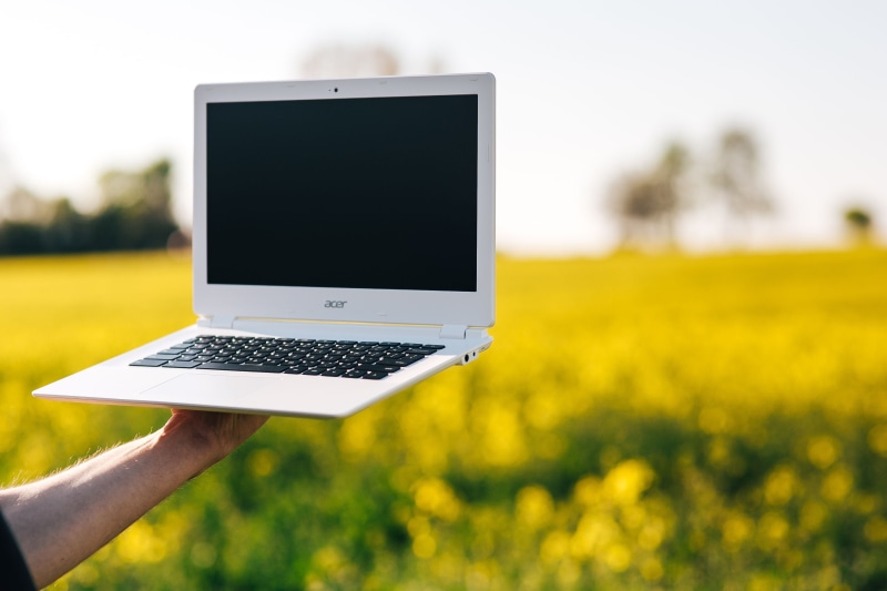 finger, land, human hand, yellow, rapeseed, computer monitor, Laptop computer, tech, focus on foreground, nature, technology, wireless Technology, communication