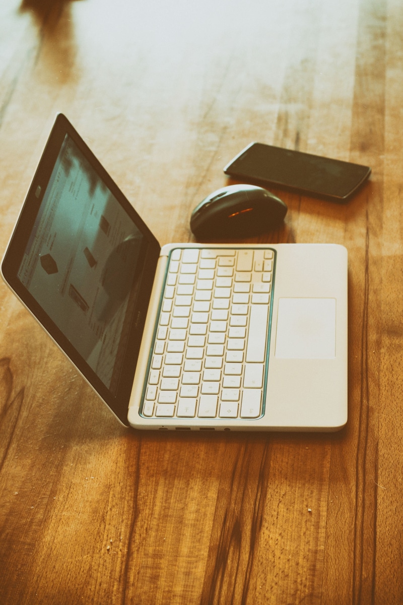 portable information device, keyboard, phone, display, indoors, wooden, web, connection, black, brown, wireless technology, no people, notebook, office