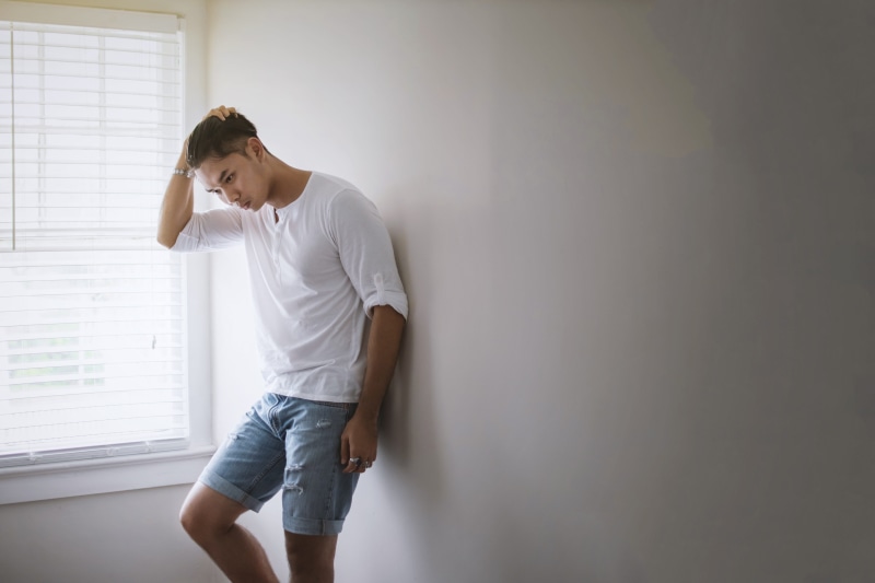 color Image, hair, clothing, black hair, man, indecision, men, denim, sadness, males, head in hands, caucasian Ethnicity, person, indecisive, wearing, depression - sadness