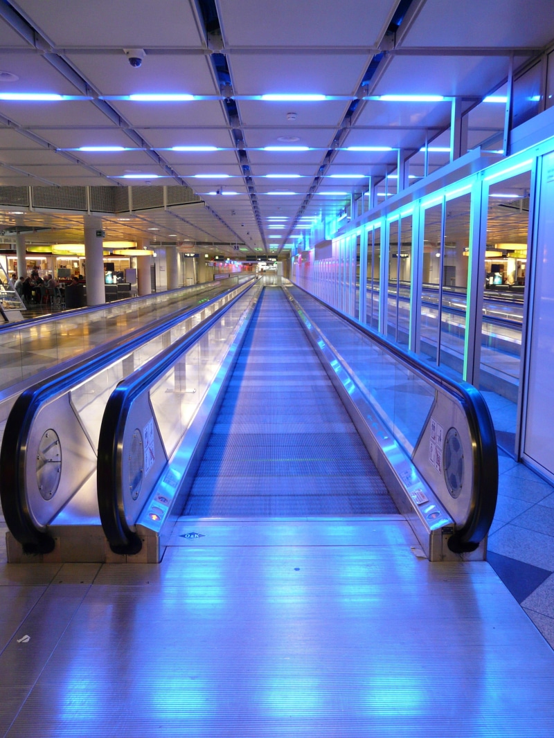 pavement, facilitate, metal segments, illuminated, blue, pathway, escalator, flooring, treadmill, movement, business trip, roll band, diminishing perspective