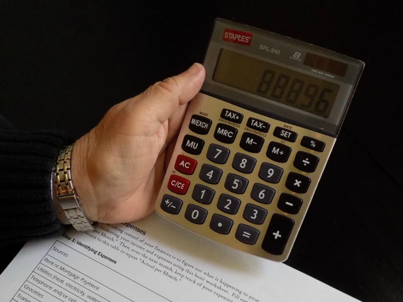 body part, one person, high angle view, math, office, men, technology, accuracy, human hand, financial, person, keypad, indoors, financial advisor, income