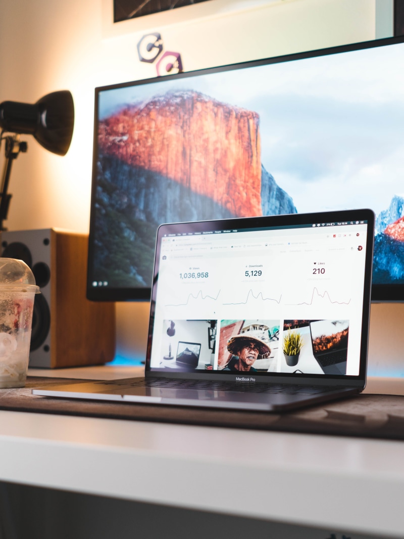 wireless technology, computer equipment, computer monitor, minimal room, camera, text, indoors, still life, gadget, human representation, iphone x, communication