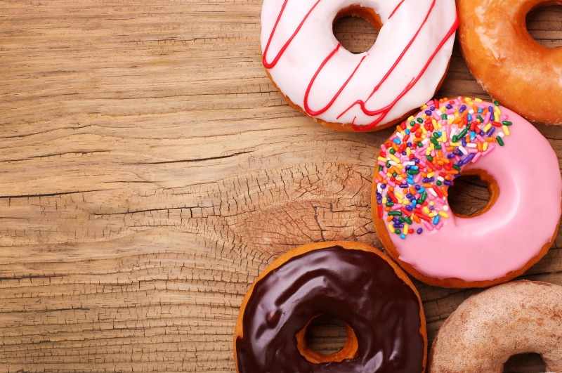 sweet food, 5K, food, no people, sprinkles, floral pattern, baked, donuts, indoors, unhealthy eating, brown, food and drink, sweet, high angle view, wood - material
