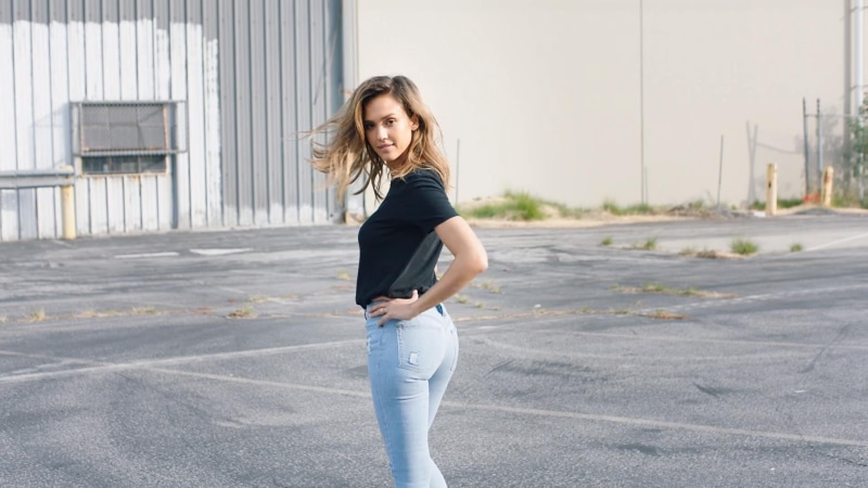 one person, built structure, standing, side view, day, women, Jessica Alba, beautiful woman, looking at camera, actress, 1080P, city, long hair, casual clothing