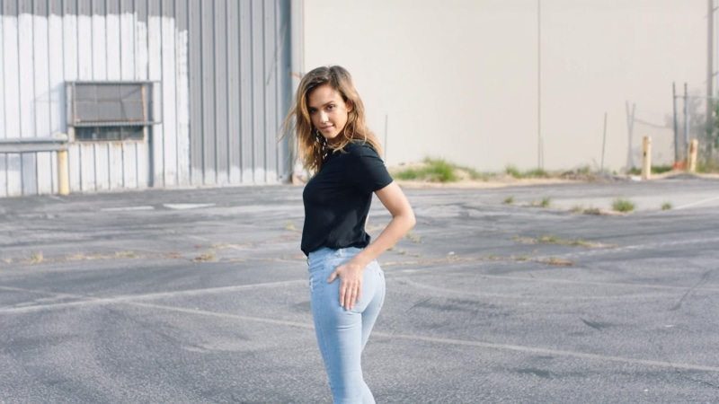 smiling, standing, beautiful woman, street, looking at camera, actress, road, confidence, portrait, blonde, adult, brown hair, architecture, hair, day