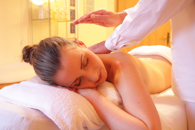 relax, body care, eyes closed, comfortable, health spa, hand, massage, spa treatment, people, adult, woman, lying down, massaging, women, beauty, wellbeing