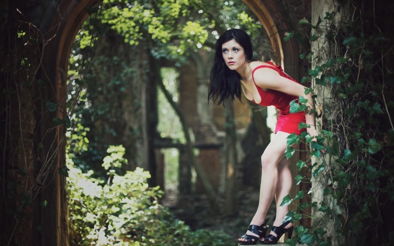 looking away, beauty, plant, bodycon, leisure activity, sleeveless, portrait, one person, casual clothing, beautiful woman, women outdoors, red dress, real people