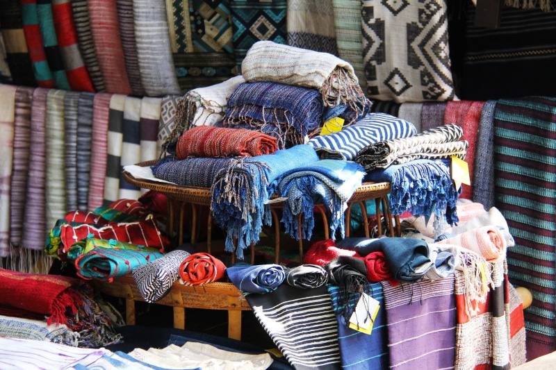 representation, still life, market, clothing, art and craft, color Image, creativity, for sale, cultures, small business, retail, shawl, no People, textile