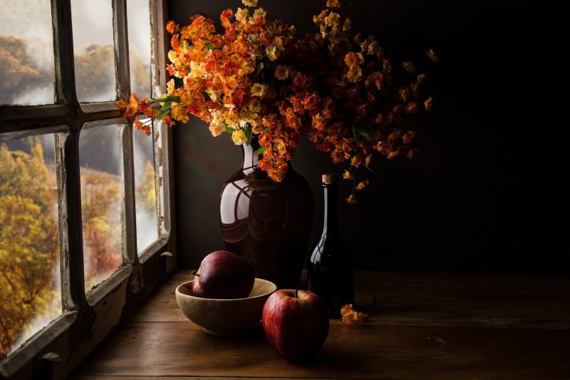apples, yellow, orange, Cup, vase, view, pitcher, autumn, the dark background, light, bouquet, bottle, window, bricks, Board, flowers, composition, still life