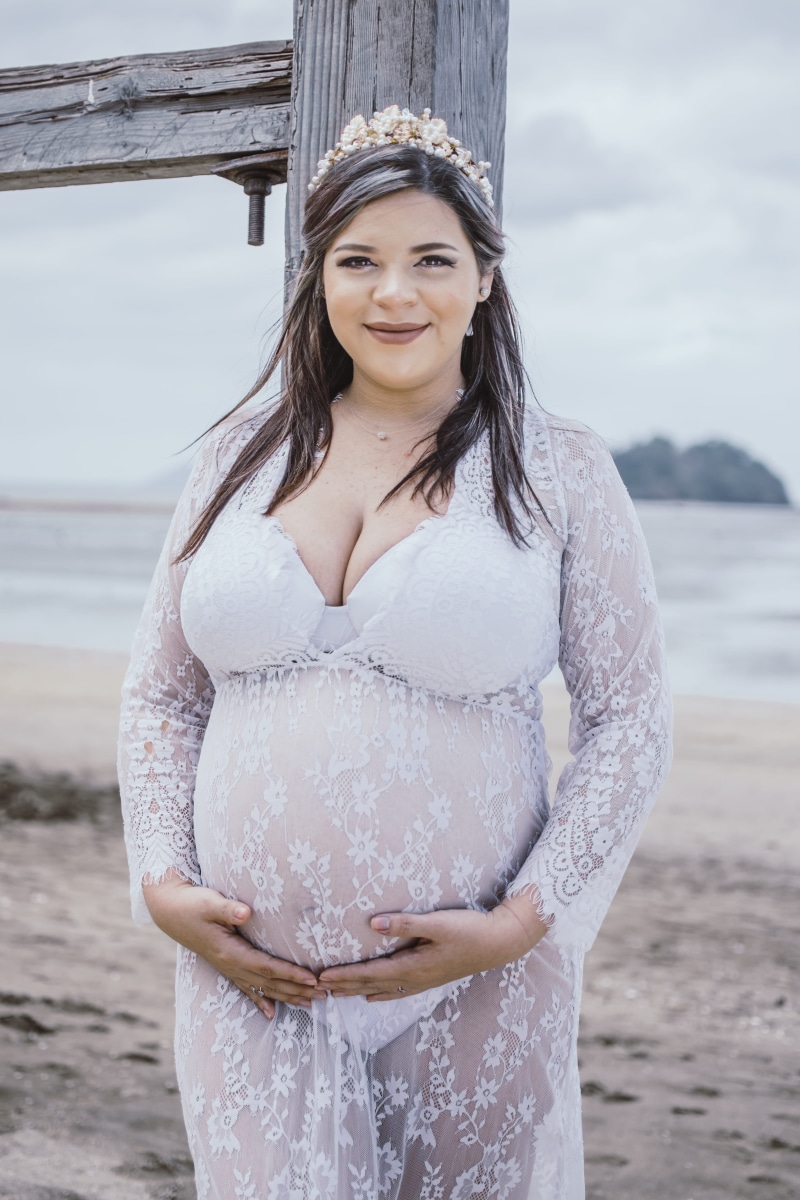 pretty, makeup, real people, front view, attractive, facial expression, wear, women, front, sea, blurred background, landscape, focus on foreground, pregnant