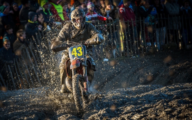 sport , men, motion, helmet, biker, racing, outdoors, sports helmet, sports race, headwear, motocross, ride, full length, crash helmet, motorcycle, leisure activity
