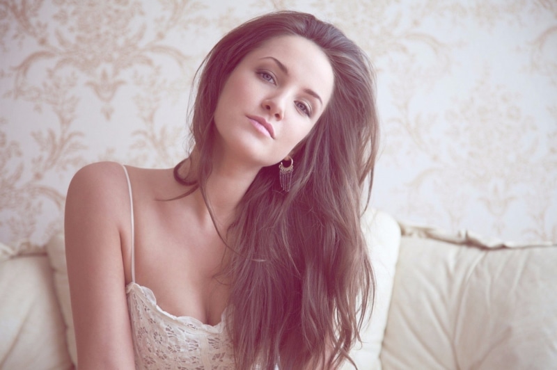 model, 1080P, women, blue eyes, couch, looking at viewer, brunette, Kristina Rodionova, photography, white dress, cushions