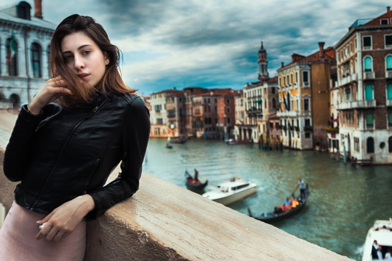 clouds, canal, women, looking at viewer, Venice, black jackets, Serena Nemera, leather jackets, Luigi Malanetto, boat, brunette, portrait, water, blurred background