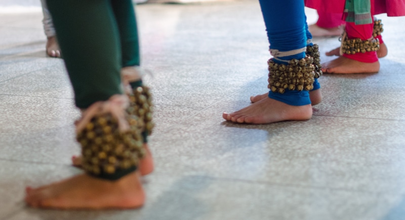 flooring, anklet, human leg, togetherness, two people, street, offspring, human limb, indian, women, bells, beaded, barefoot, outdoors, low section, city