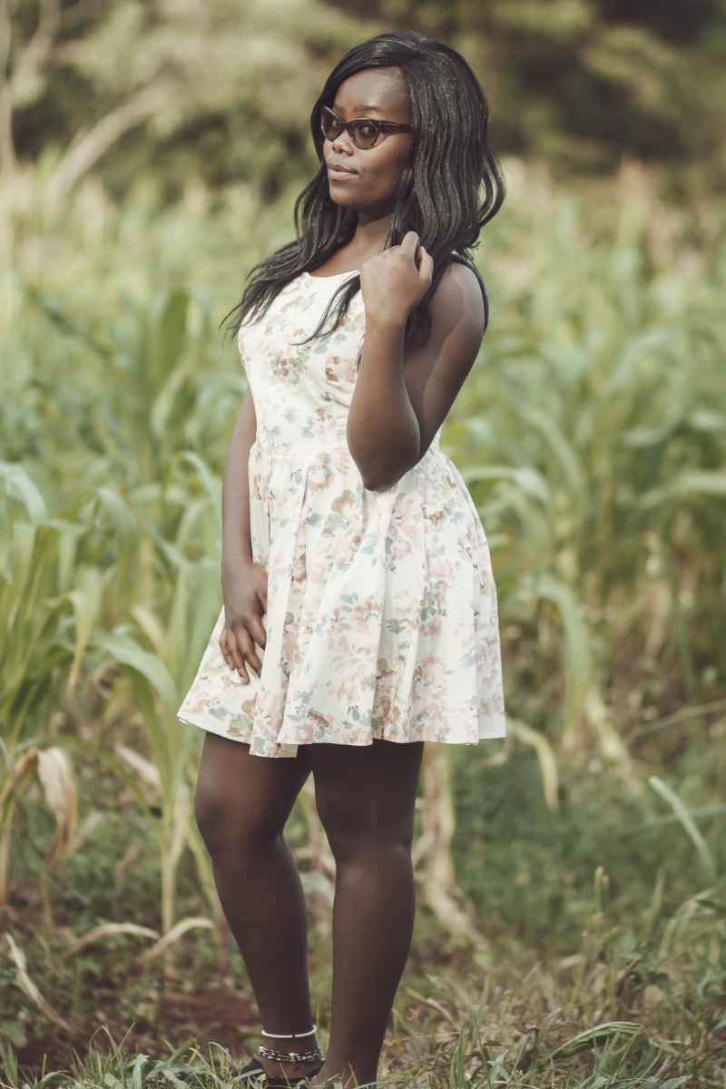 land, beautiful woman, anklet, women, hair, outdoors, young women, lifestyles, focus on foreground, portrait, one person, grass, dimple, field, woman, wear