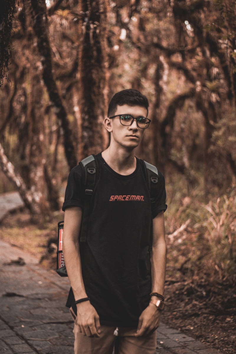 male, young men, one person, tree, people, real people, outdoor, guy, anklet, black, standing, leisure activity, ornament, portrait, plant, glasses, casual clothing