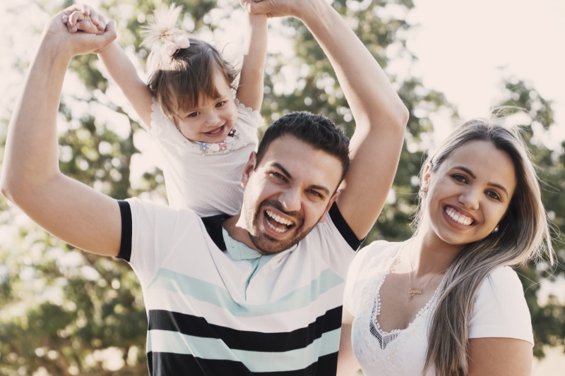 leisure activity, mom, family, positive emotion, three people, 4K, women, parents, lifestyles, mother, looking at camera, dad, father, front view, child