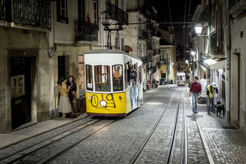 railroad track, rail transportation, people, real people, 1080P, incidental people, Portugal, women, cable car, men, track, Lisbon, mode of transportation