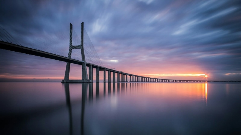 vasco da gama bridge, evening, horizon, bridge - man made structure, built structure, sun, reflection, nature, beauty in nature, long exposure, architecture