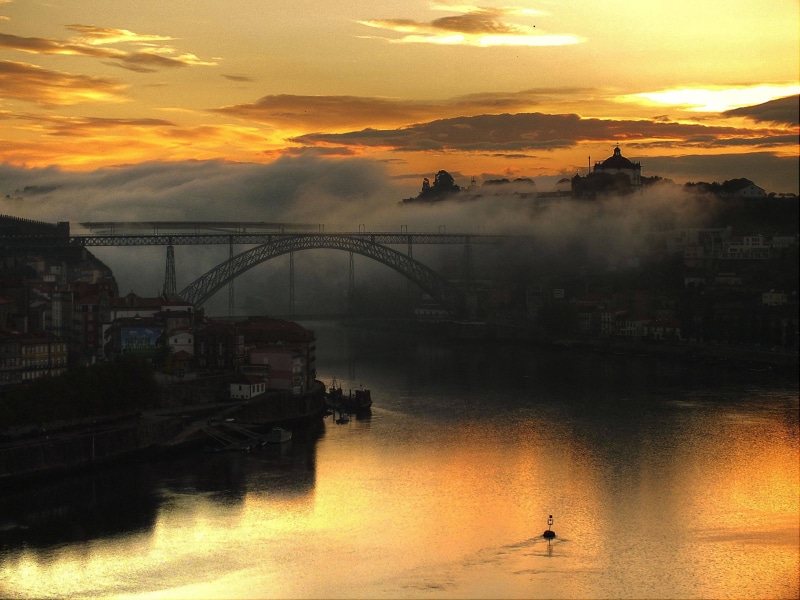 city, building exterior, sunlight, bridge - man made structure, cityscape, connection, 2K, gray, beauty in nature, arch bridge, orange color, transportation