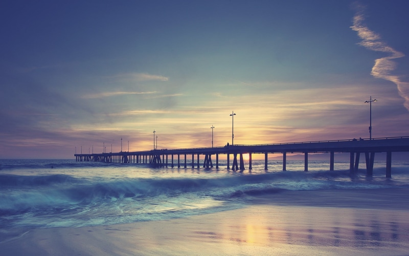 motion, water, sunset, tranquility, nature, scenics - nature, built structure, cloud - sky, wooden, beach, pier, connection, tranquil scene, horizon over water