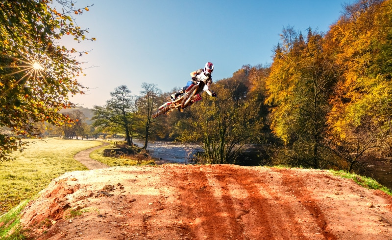 edit, jumping, land, fast, sport, track, autumn sunshine, beautiful, bolton abbey, whip, full length, light, morning sunlight, man, leisure activity, motion