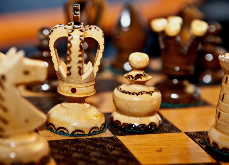 the strategy, tray, food and drink, group of objects, craft, focus on foreground, metal, no people, the gameplay, antique, fired, close-up, wood - material