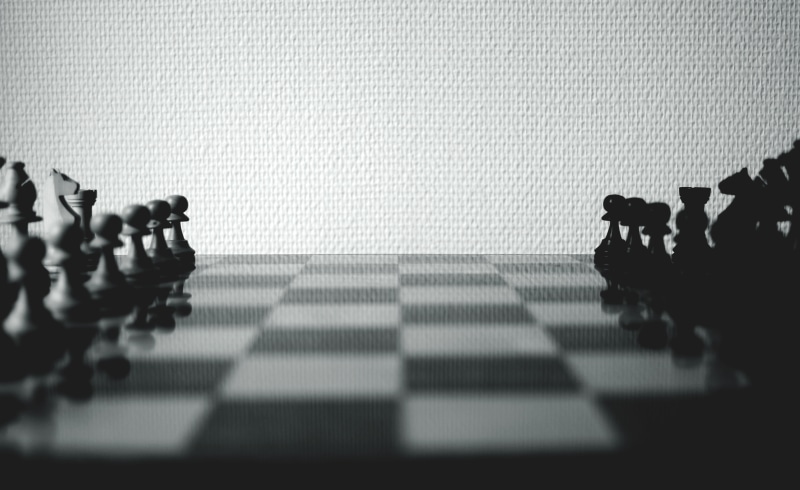 piano, arranged, chess, no people, street, shadow, dof, blur, chess piece, game, leisure activity, strategy, checked pattern, chessboard, monochrome, arts culture and entertainment