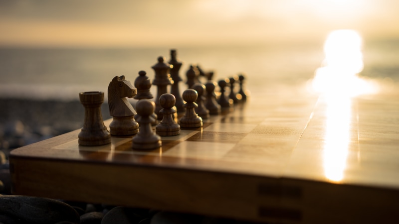 sky, wooden, sea, pawn - chess piece, leisure activity, knight - chess piece, arts culture and entertainment, the game, leisure games, strategy, queen - chess piece