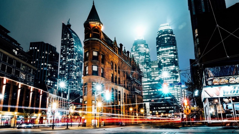 architecture, tourist attraction, night, toronto, city life, office building exterior, light trail, gooderham building, transportation, city street, motion