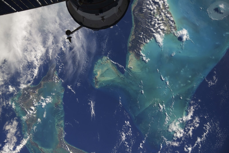 space, air vehicle, aerial view, travel, black, Earth, motion, sea, nature, no people, water, transportation, mode of transportation, sport, white, 2K
