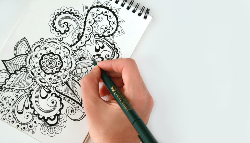 activity, pen, human hand, art, drawing - activity, flower, pad, work, indoors, fingers, graphic, pencil, paper, illustration, sketchbook, black, symbol