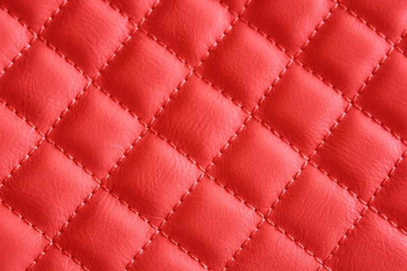 macro, quilted, textured effect, surface level, luxury, full frame, blank, backgrounds, pattern, pink color, textile, extreme close-up, leather, textured