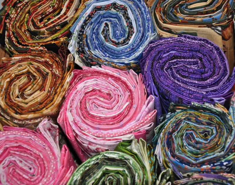choice, no people, rolled up, cotton, homemade, fabric, day, large group of objects, traditional, material, backgrounds, quilted, patch, colorful, fabric background