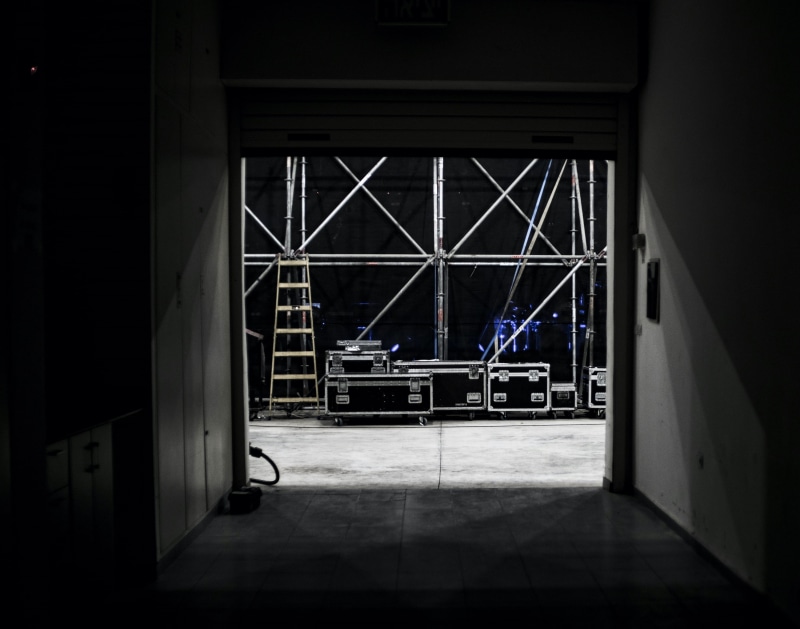 transport, case, gear, indoors, opened, door, built structure, roadie, roll, flooring, box, stage, gray, empty, 2K, entrance, scaffold, window, electronic