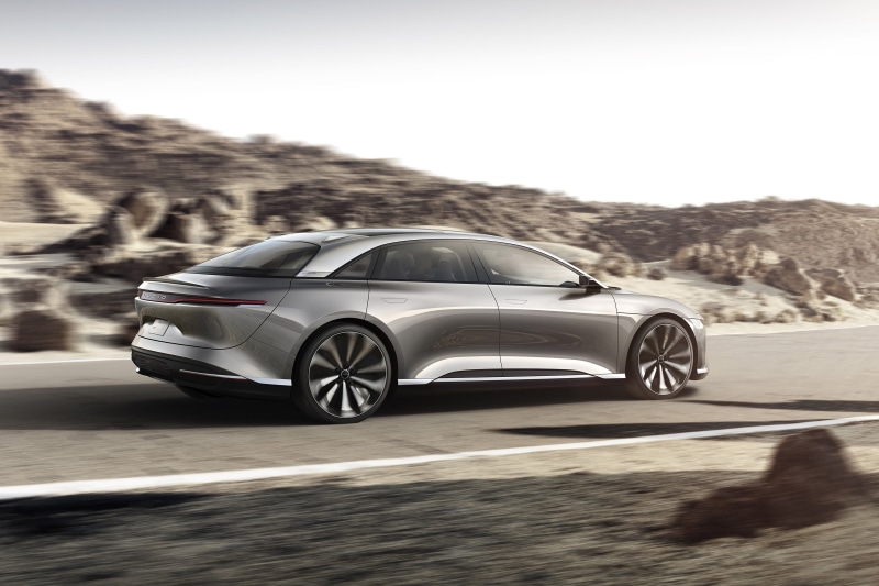 wheel, transportation, no people, day, mode of transportation, air, lucid air concept, outdoors, nature, silver colored, travel, sports car, motor vehicle