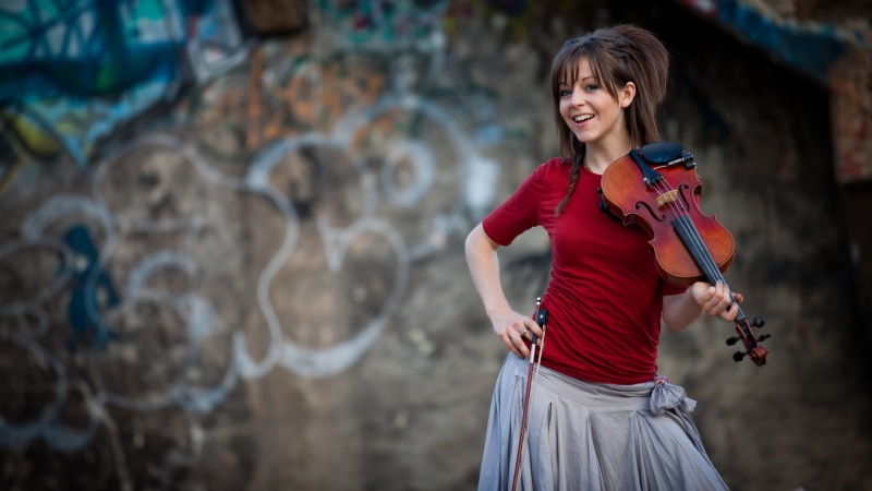 standing, hair, graffiti, Lindsey Stirling, beauty, 2K, portrait, one person, young women, s, looking at camera, violin, young adult, performance, beautiful woman
