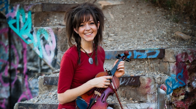musician, arts culture and entertainment, musical instrument, wall - building feature, casual clothing, hairstyle, holding, artist, Lindsey Stirling, lifestyles