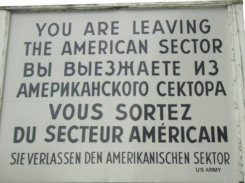 close-up, outdoors, built structure, american, message, western script, script, guidance, communication, DDR, warning sign, information sign, sector, capital letter