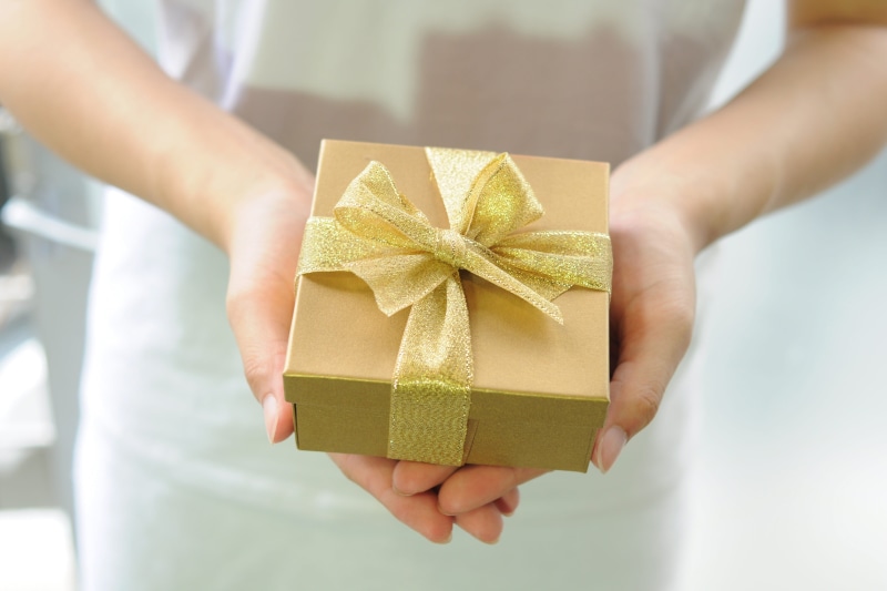 surprise, birthday, human hand, indoors, human body part, hand, giving, ribbon - sewing item, celebration, people, ribbon, box - container, tied bow, gift