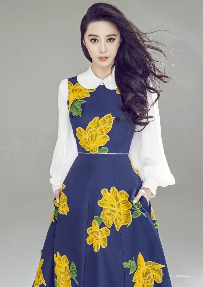clothing, blue, adult, yellow, one person, front view, beautiful people, dress, teenager, hair, indoors, floral, fashion, s, beautiful woman, women, looking at camera