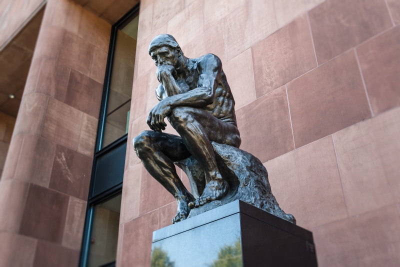 travel destinations, human, art, thinking, outdoors, metal, building exterior, art and craft, memorial, thinker, day, representation, built structure, statue