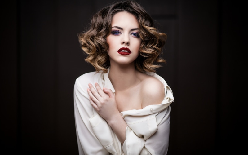 fashion model, elegance, one person, indoors, portrait, beauty, looking at camera, studio shot, black background, beautiful woman, adult, glamour, women