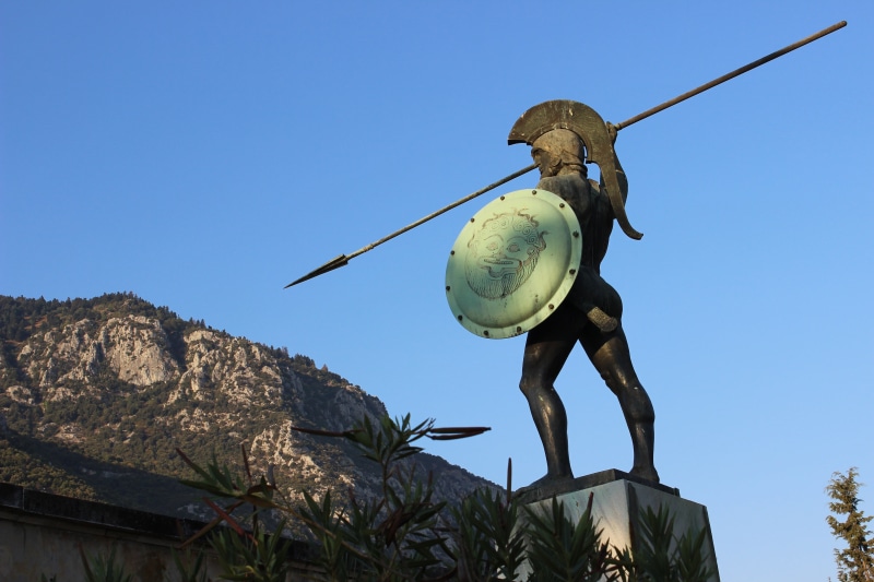 warrior, antiquity, ancient, leisure activity, copy space, statue, facing, king, sport, clear sky, low angle view, shield, sculpture, thermopylae, sparta